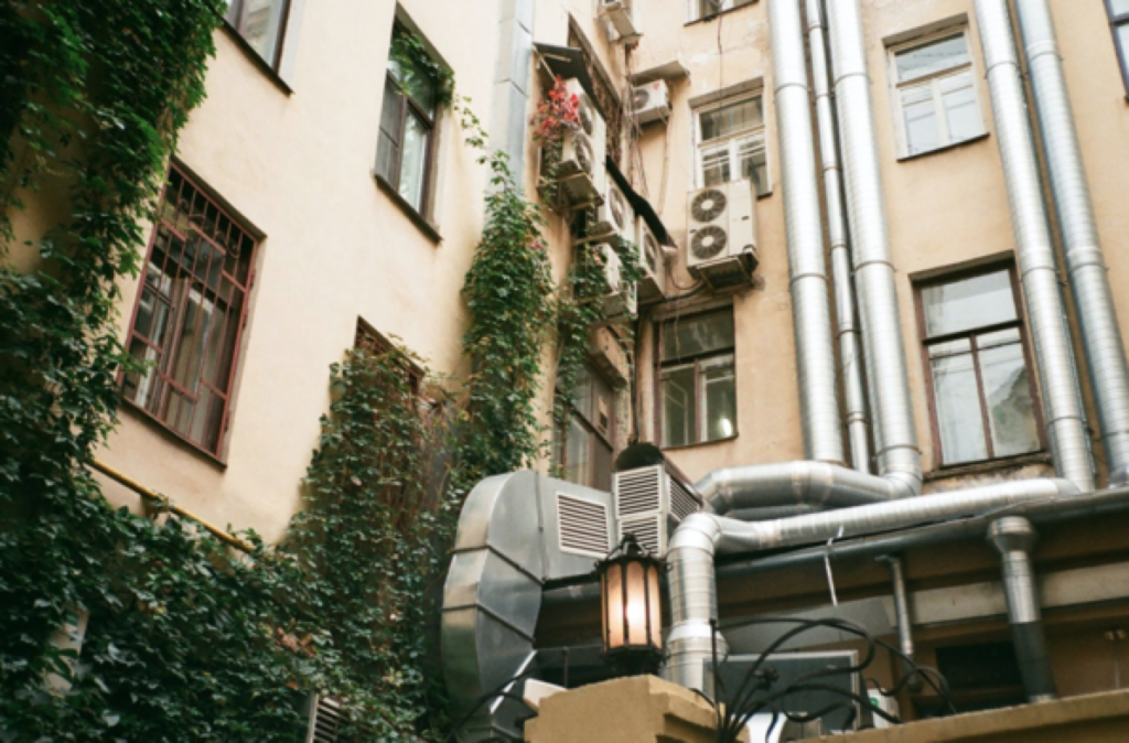 Exterior Of Modern Building With Ivy 1024 X 674 1 demonstrating ParqEx's smart parking technology in action.